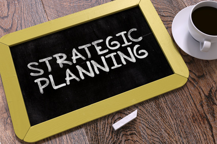 Strategic Planning Concept Hand Drawn on Chalkboard.